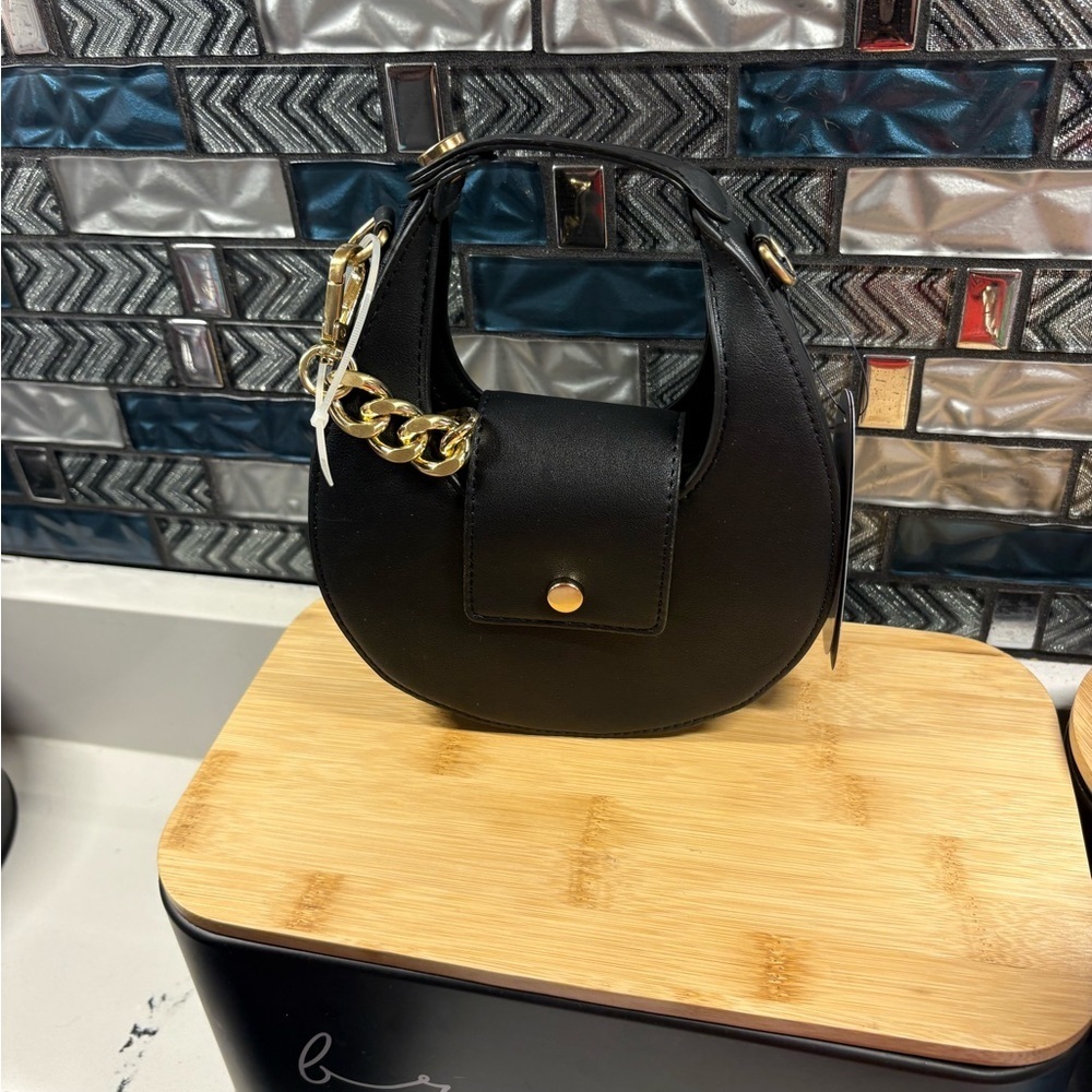 Elegant Black Mini Bag with Gold Accents